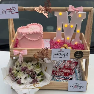 Wooden basket with cake, flowers, and teddy bear – Mother’s Day Gift by Gift Shop Islamabad