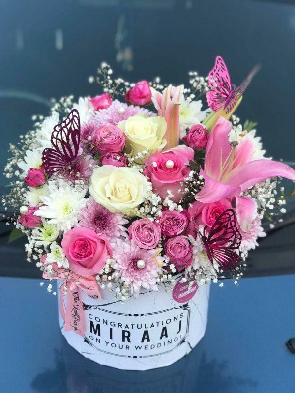 Butterfly Bloom Box with roses and chrysanthemums in a custom printed box – luxury flower gift in Islamabad