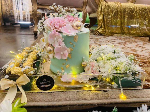 Bloom and Cake Majestic floral cake with Ferrero in acrylic tray by Gift Shop Islamabad